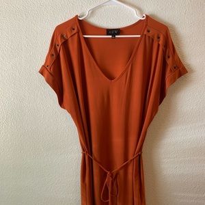 A U W pretty silky blouse. Good condition.